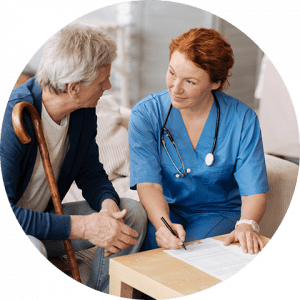 business-telecom-provider-image-Male patient talking to redheaded female medical professional