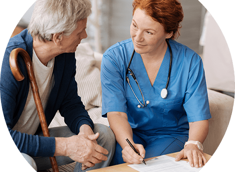 business-telecom-provider-image-Male patient talking to redheaded female medical professional