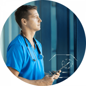 business-telecom-provider-image-Male doctor wearing blue scrubs and stethoscope holding an ipad