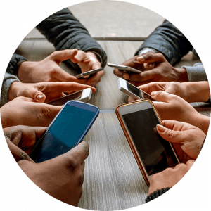 business-telecom-provider-image-Close up of six people's hands holding smartphones