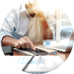 man sits in front of computer