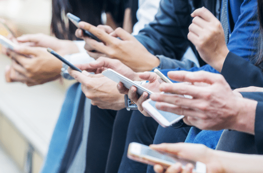 Bringing the benefits of software defined to mobility - people holding smartphones