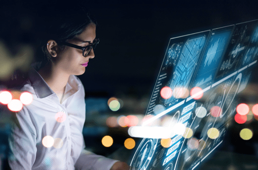 featured image – 10 Predictions For A New Decade: How 5G, Digital Transformation And Cloud Will Impact How We Work – Woman on high tech screen