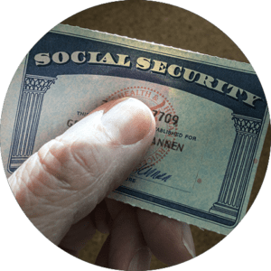 Hand holding social security card