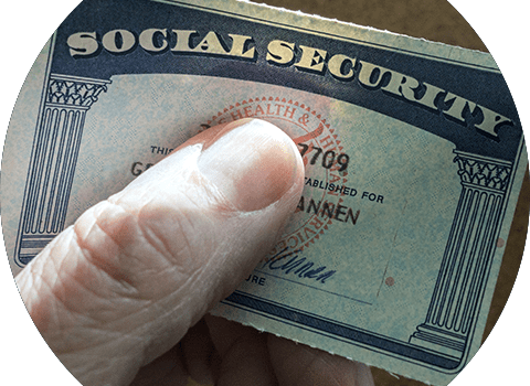 Hand holding social security card