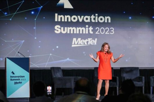 Lori Thomas on stage at the MetTel 2023 Innovation Summit
