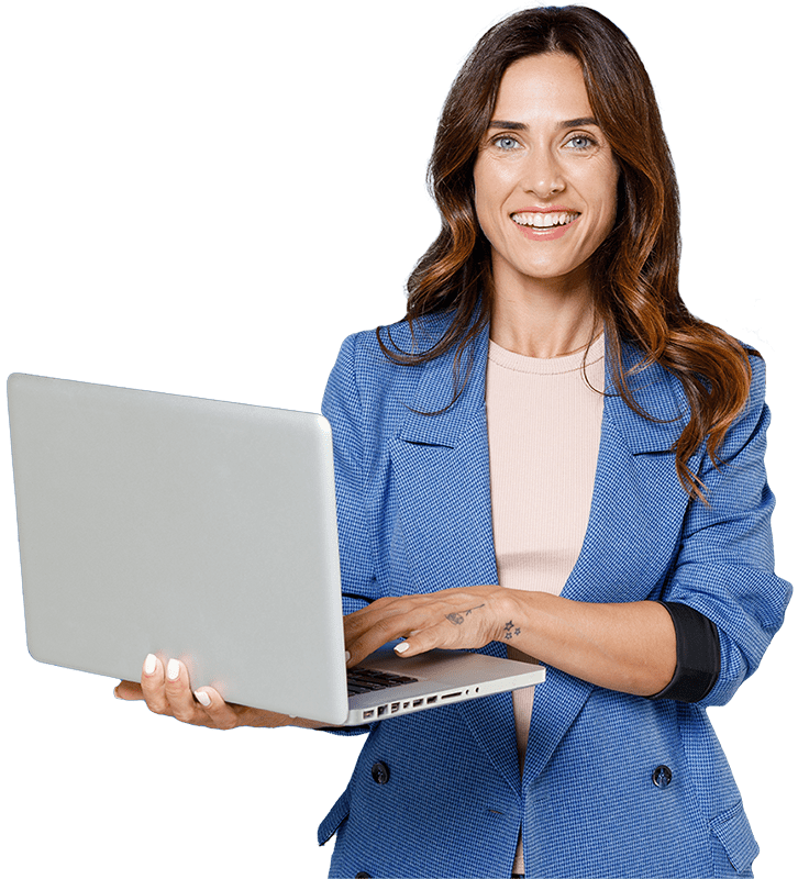 woman wearing blazer holding laptop