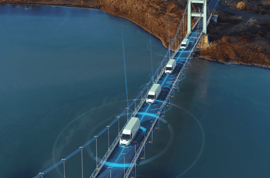 iot in transportation - smart trucks crossing a bridge
