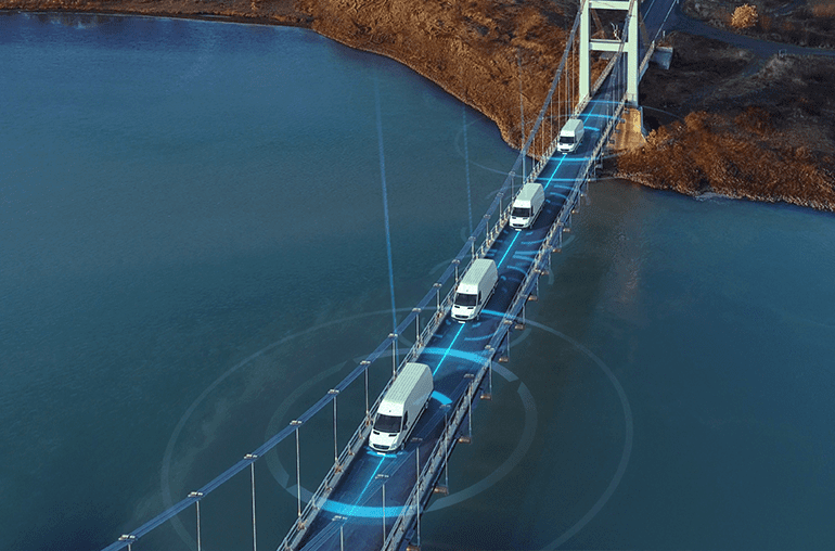 iot in transportation - smart trucks crossing a bridge